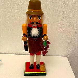Vintage Nutcracker Grape Maker Sommelier with Grapes and Wine Bottle